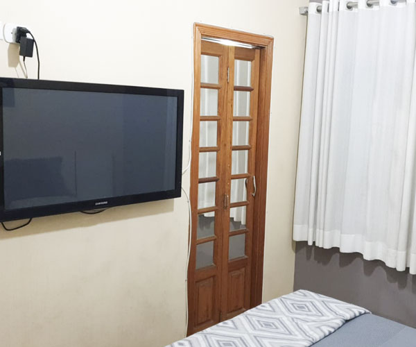 Quarto principal com cama de casal